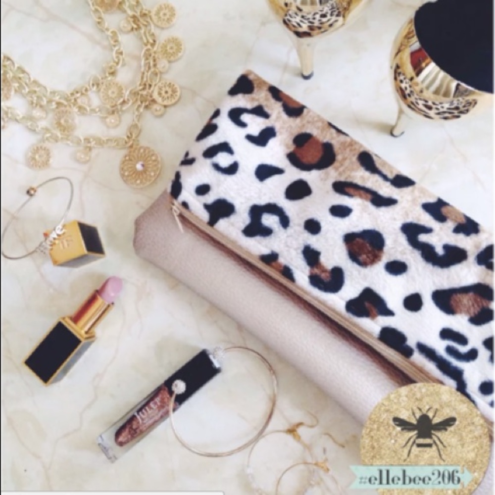 Leopard vegan leather clutch by ellebee