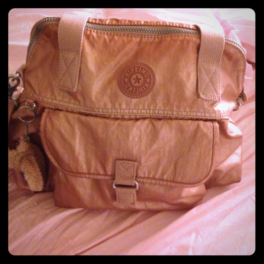 Kipling  beige shiney purse w/ monkey!