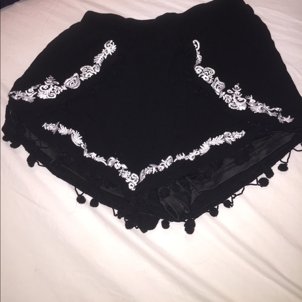 Francesca's Black shorts with Pom Poms