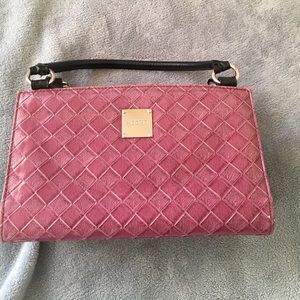 Niche purse with purple shell