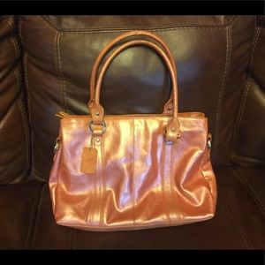 Iris Tyler rose gold hand bag