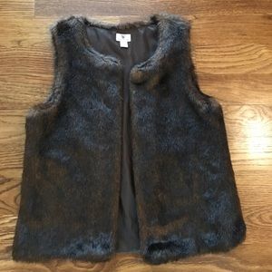 Brown faux fur vest.