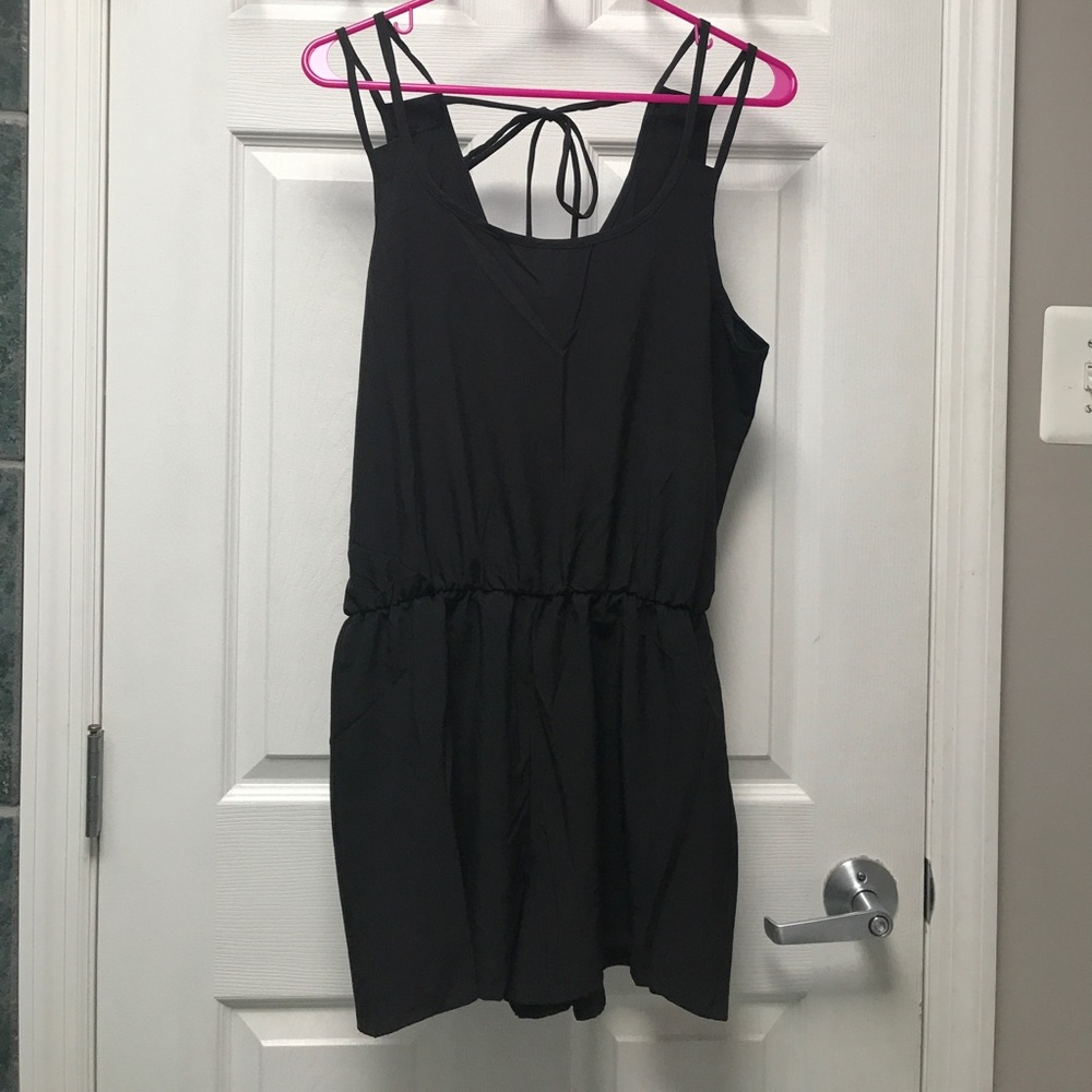 Size large solid black romper