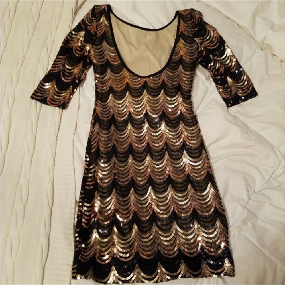 Black and gold sequin party dress