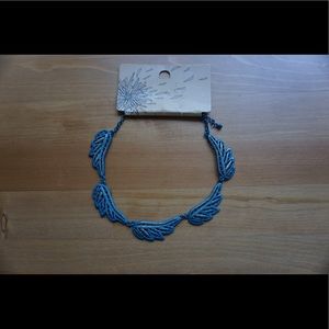 Blue metallic leaf necklace