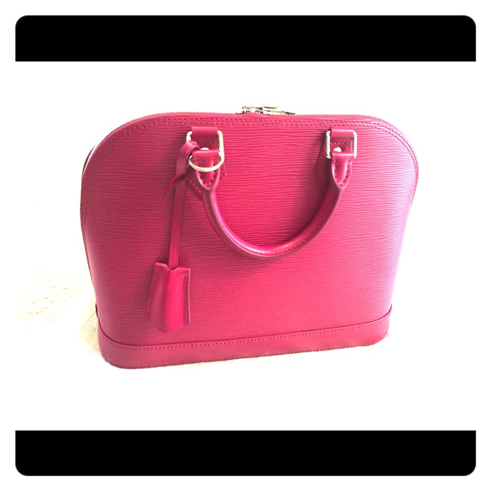 Authentic Louis Vuitton Alma in rasberry red