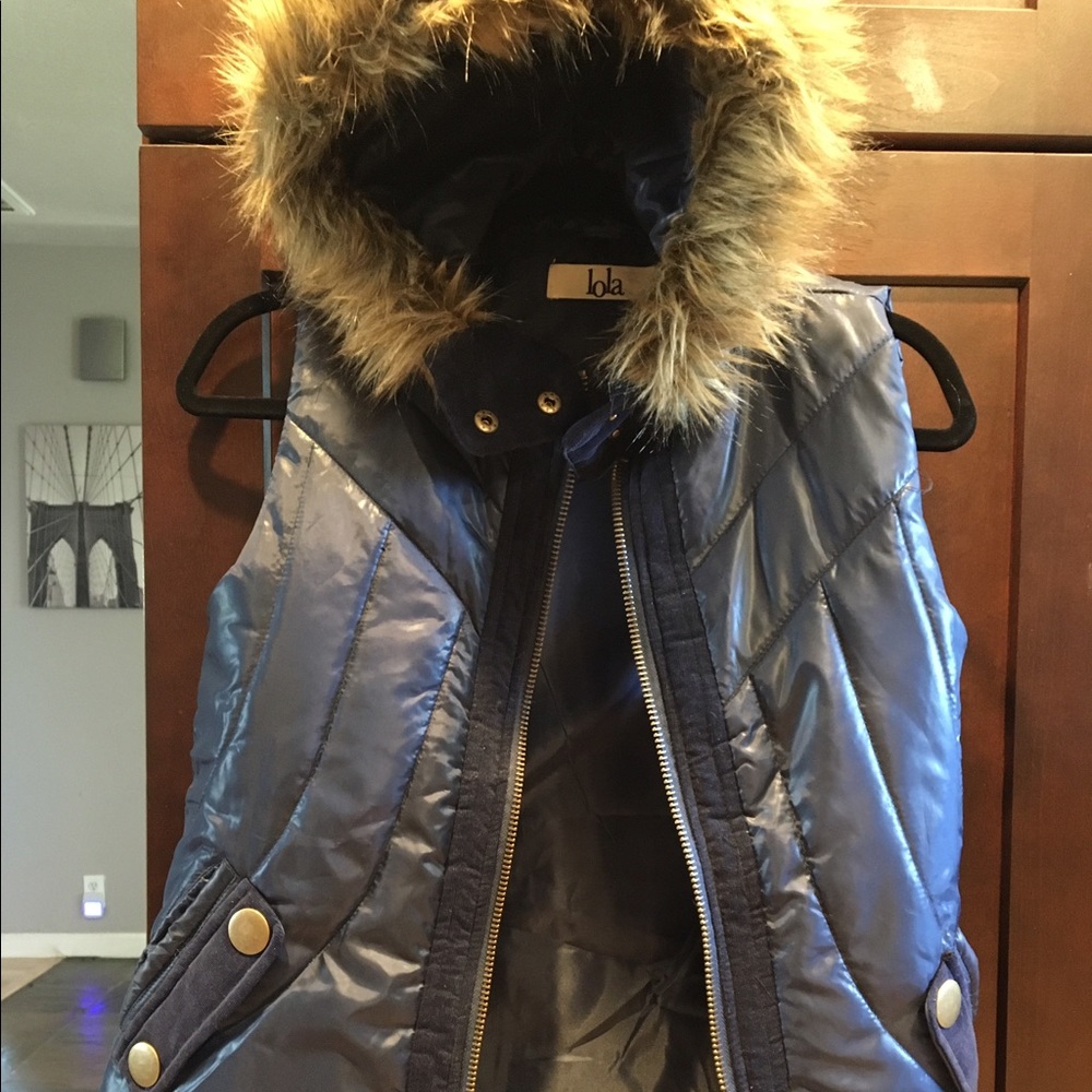 Blue vest with faux fur trim hood