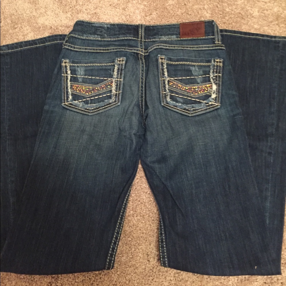 Like NEW buckle jeans.