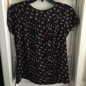 Floral printed tucked front blouse with solid back