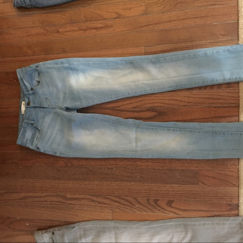 Distressed light wash jeans