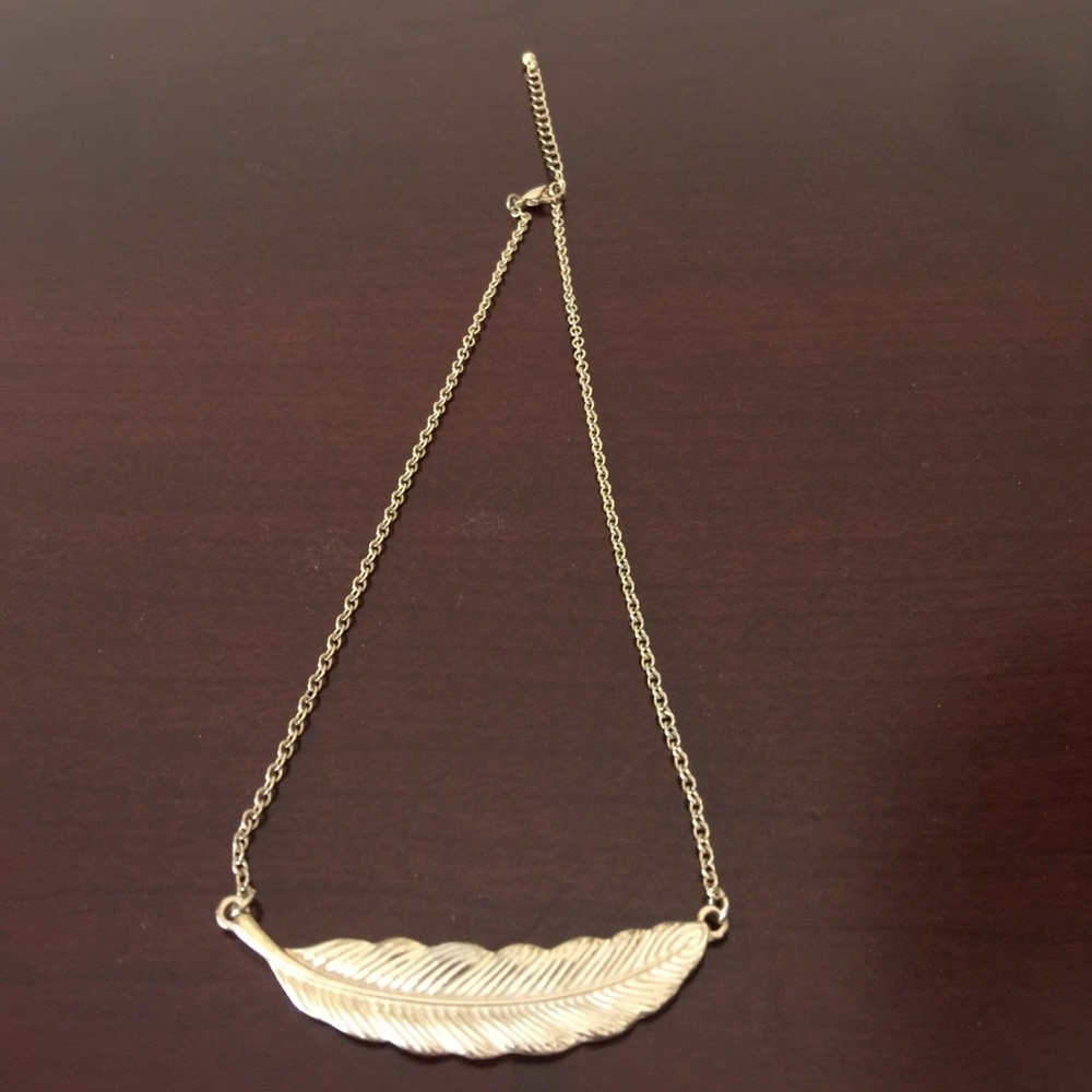 Gold feather necklace