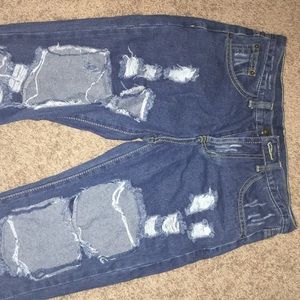 Semi high waisted destroyed jeans