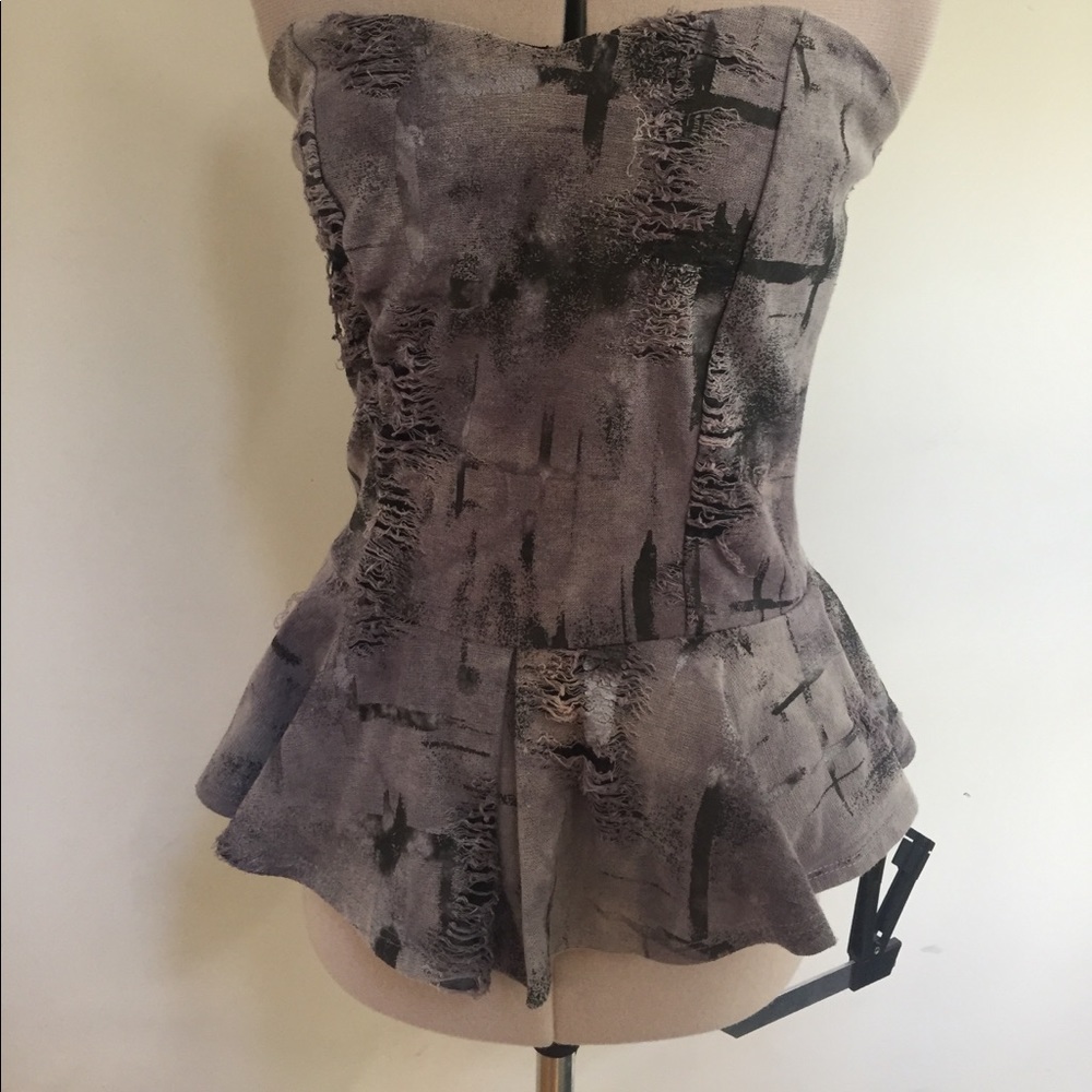 Distressed peplum top