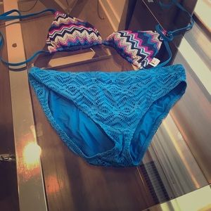 Becca string bikini in solid blue bottom.