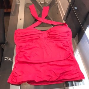 Pink tankini top with flattering draping.