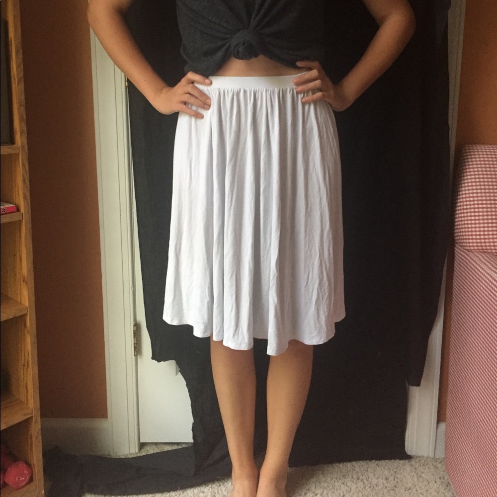 Knee length white midi skirt