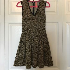 Black and gold drop-waist dress