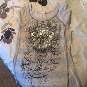 Grey and white shirt with a design