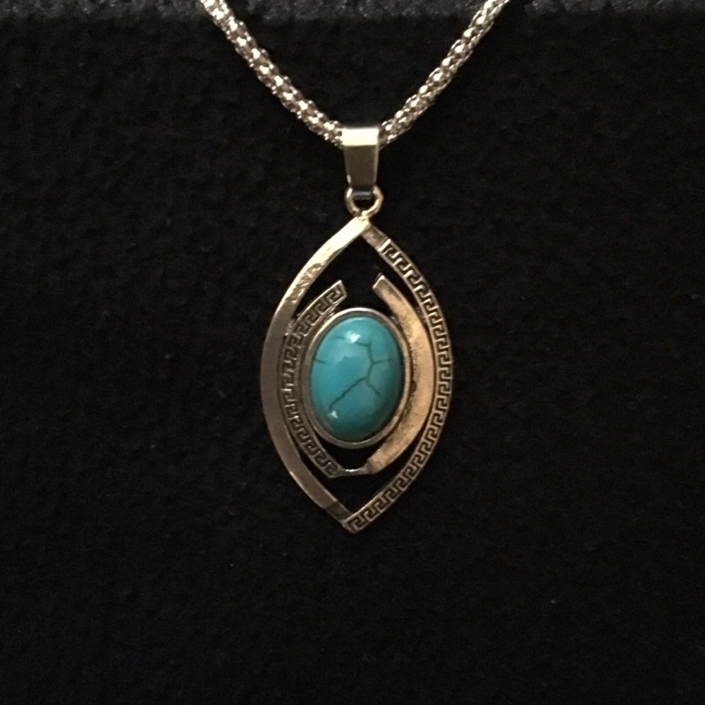 Turquoise and silver colored necklace