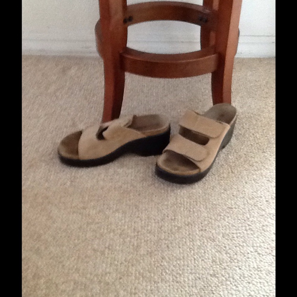 This shoe has been worn, and is in good condition.