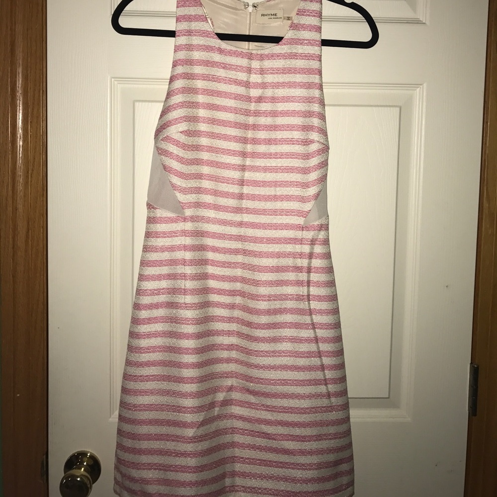Rhyme dress size small with netting on side