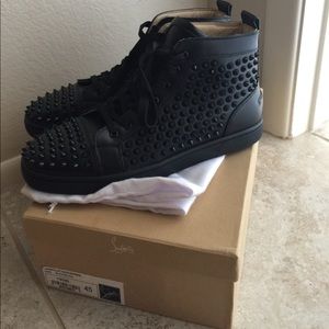 Christian Louboutins spiked black shoes