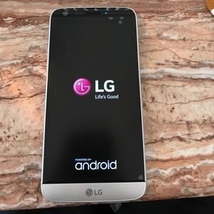 T-Mobile  Silver LG G5 lightly used.