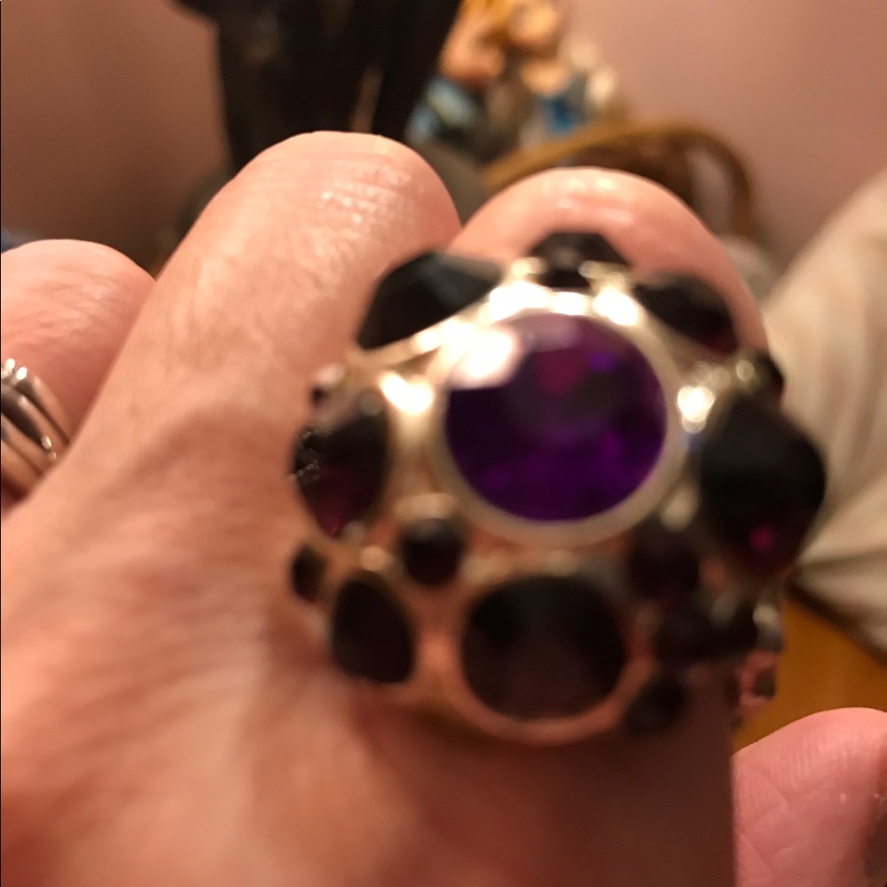 Silver tone ring w purple stones