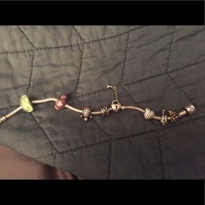 Pandora Charms and bracelet. Sold separately.