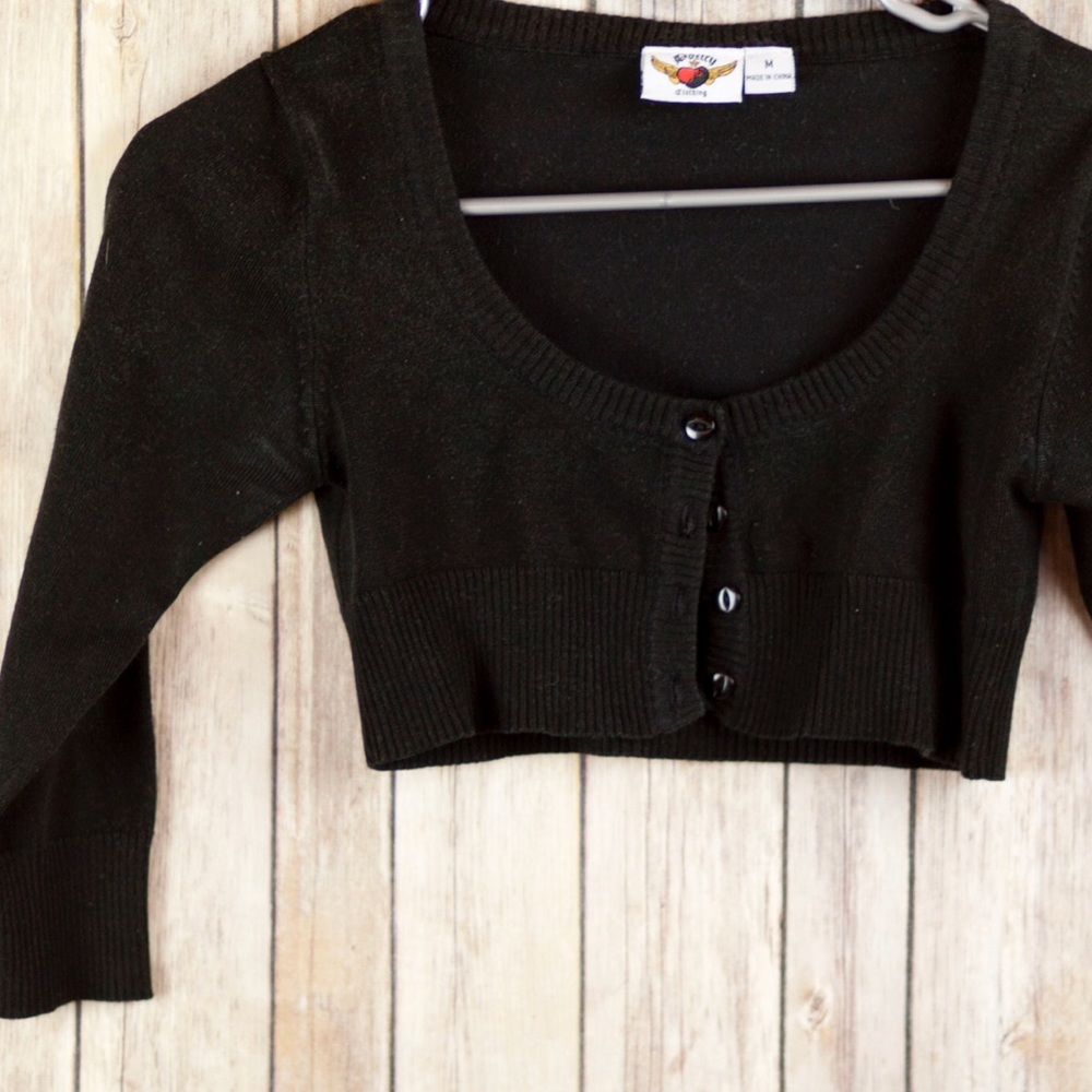 Black shrug