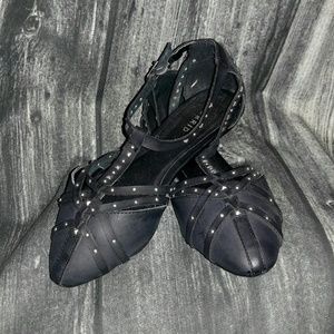Torrid pointed spiked flats.