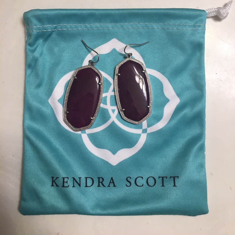 Deep purple and silver Kendra scott earrings.
