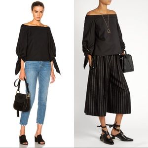 TIBI AGATHE off the shoulder sculpted top black