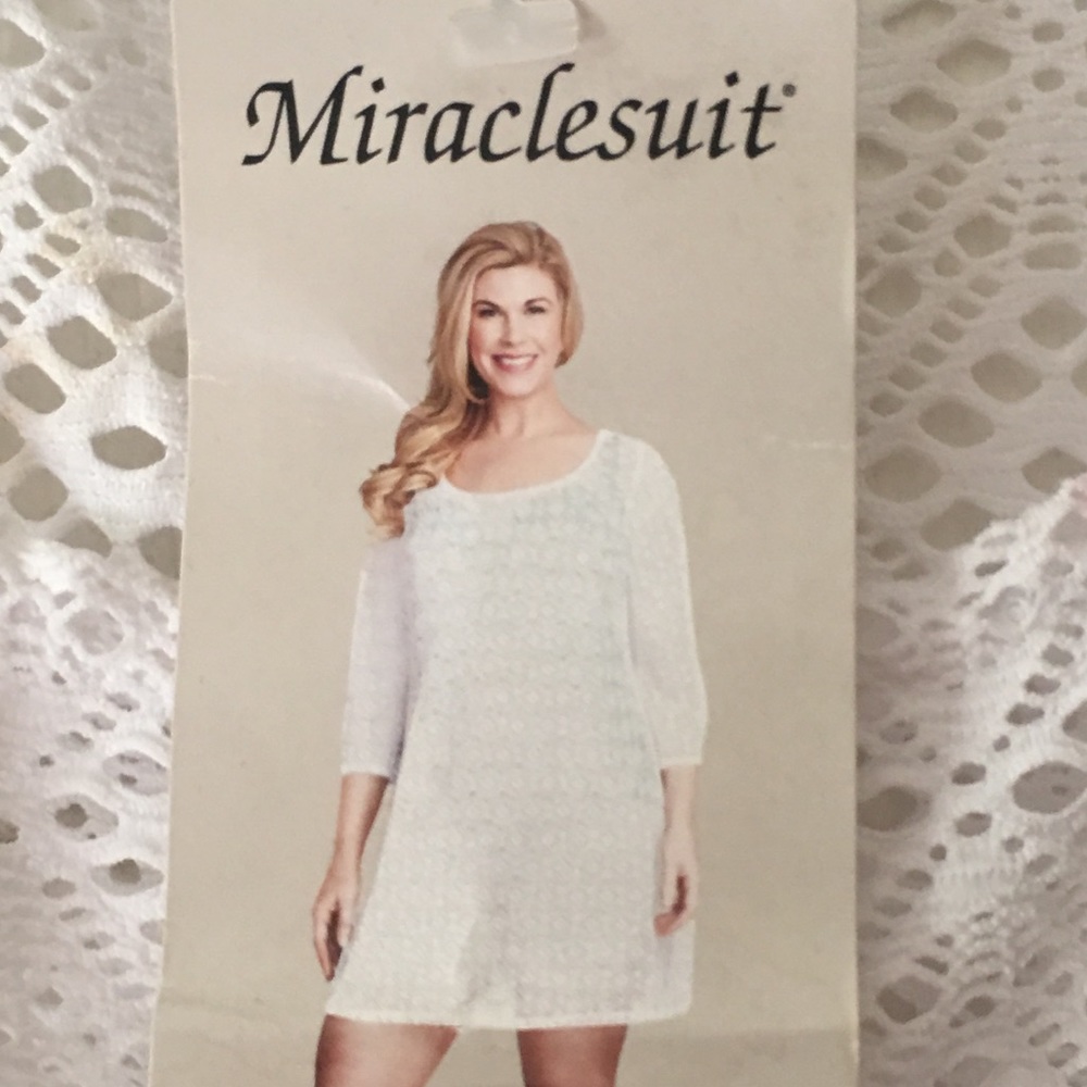 White swimsuit Tunic by Miraclesuit size Medium.
