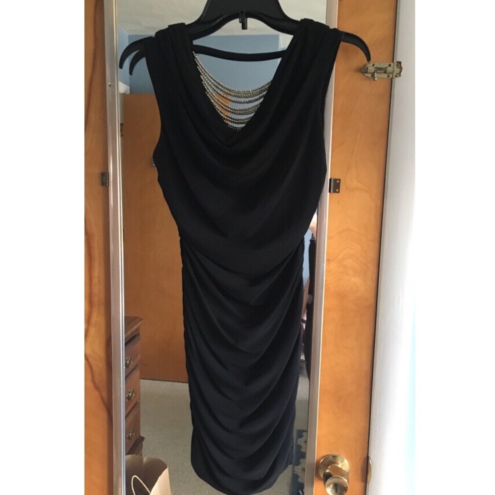 black sleeveless scoop neck dress
