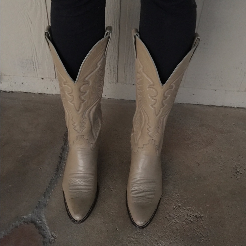Tan/beige cowgirl boots.