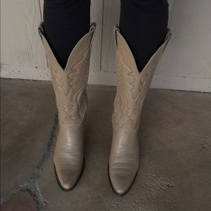 Tan/beige cowgirl boots.