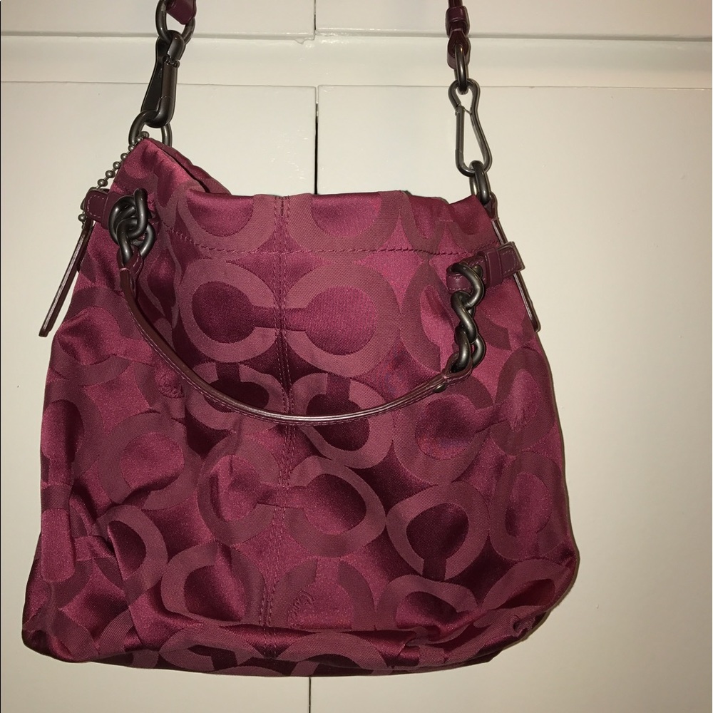 Red Coach monogram handbag.