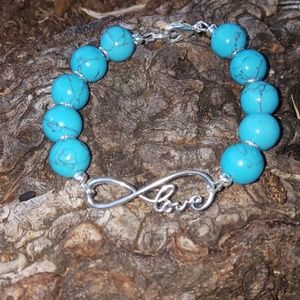 12mm turquoise beaded bracelet with Love spacer