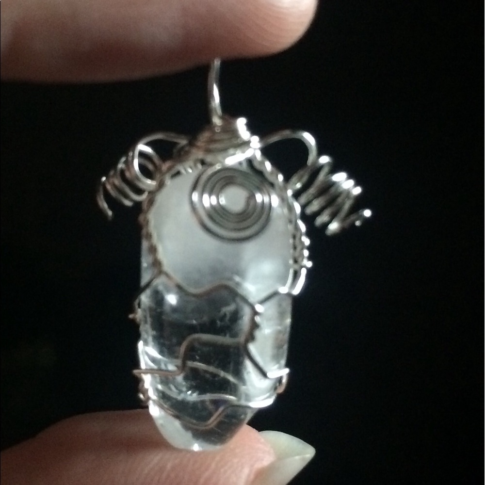 Wire wrapped clear quartz crystal pendant