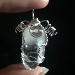 Wire wrapped clear quartz crystal pendant