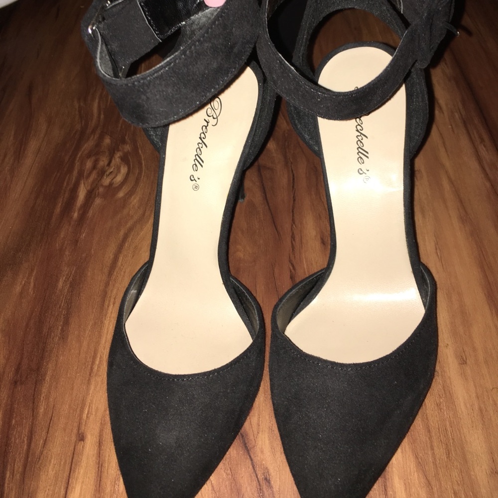 Black close toe strap heels