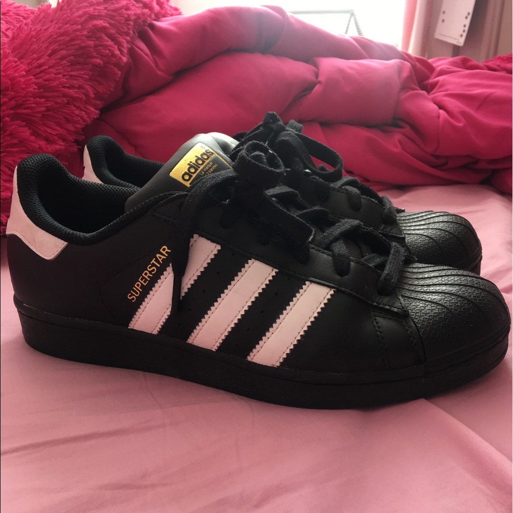 Black and white superstar adidas