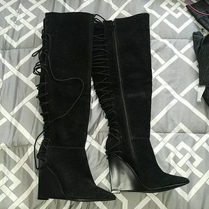 Knee high black boots worn one time