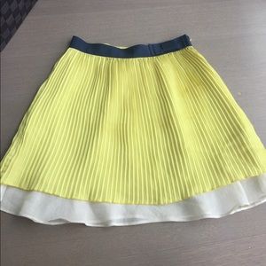 Plastic Island yellow pleated skirt