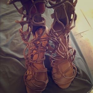 High lace detail nude heels.