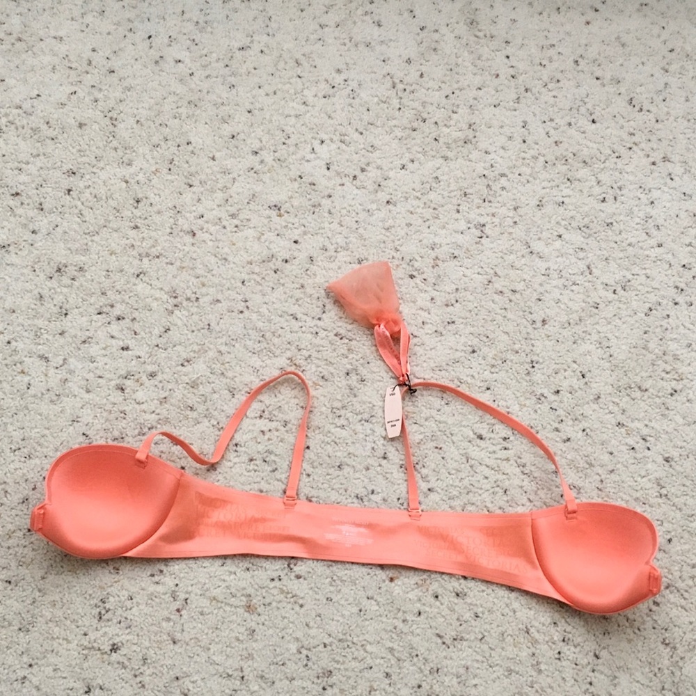 Coral front hook strapless bra. With clear straps
