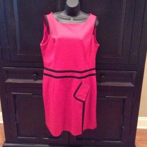 Red dress with black detail.