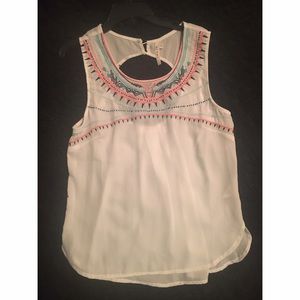 White top with colored print