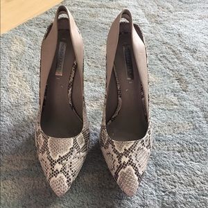 BCBG pre-owned snakeskin pumps